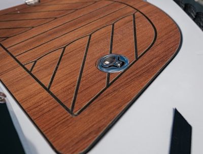 a close up of a wooden floor on a boat